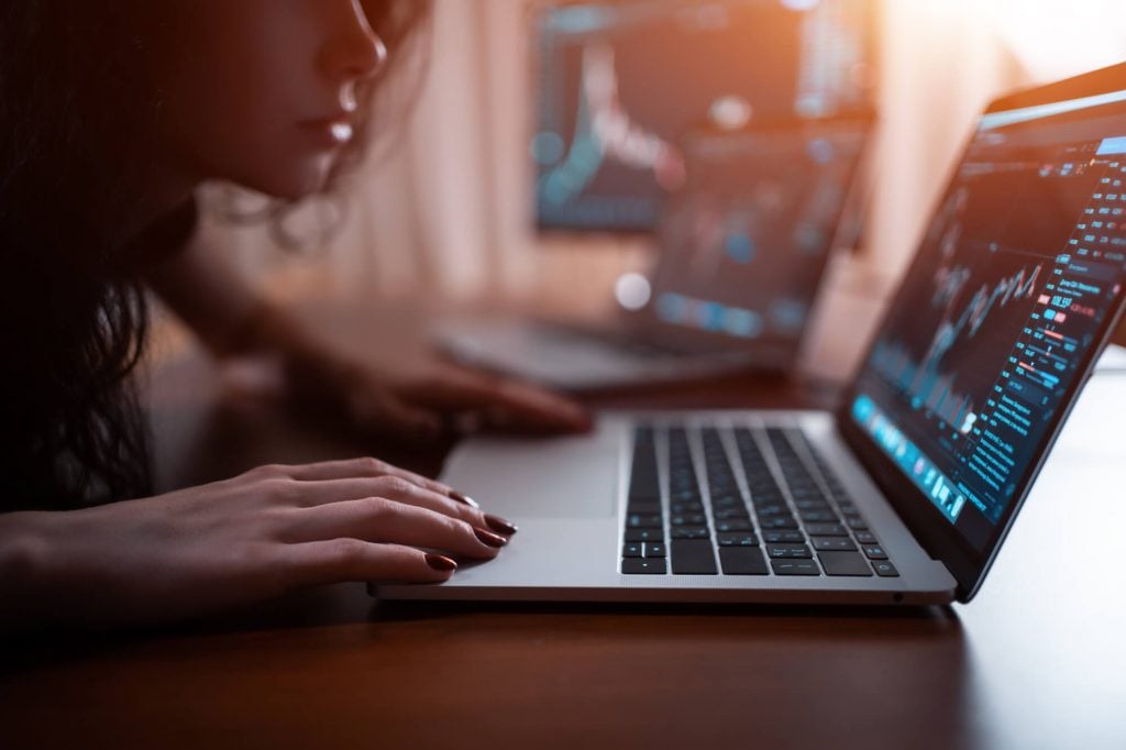 woman on computer stocks