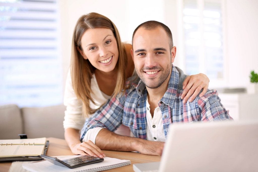 couple looking at stocks