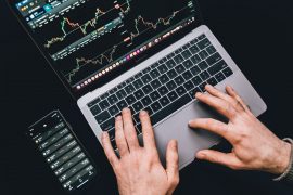 person-looking-at-stock-market person-looking-at-stock-market