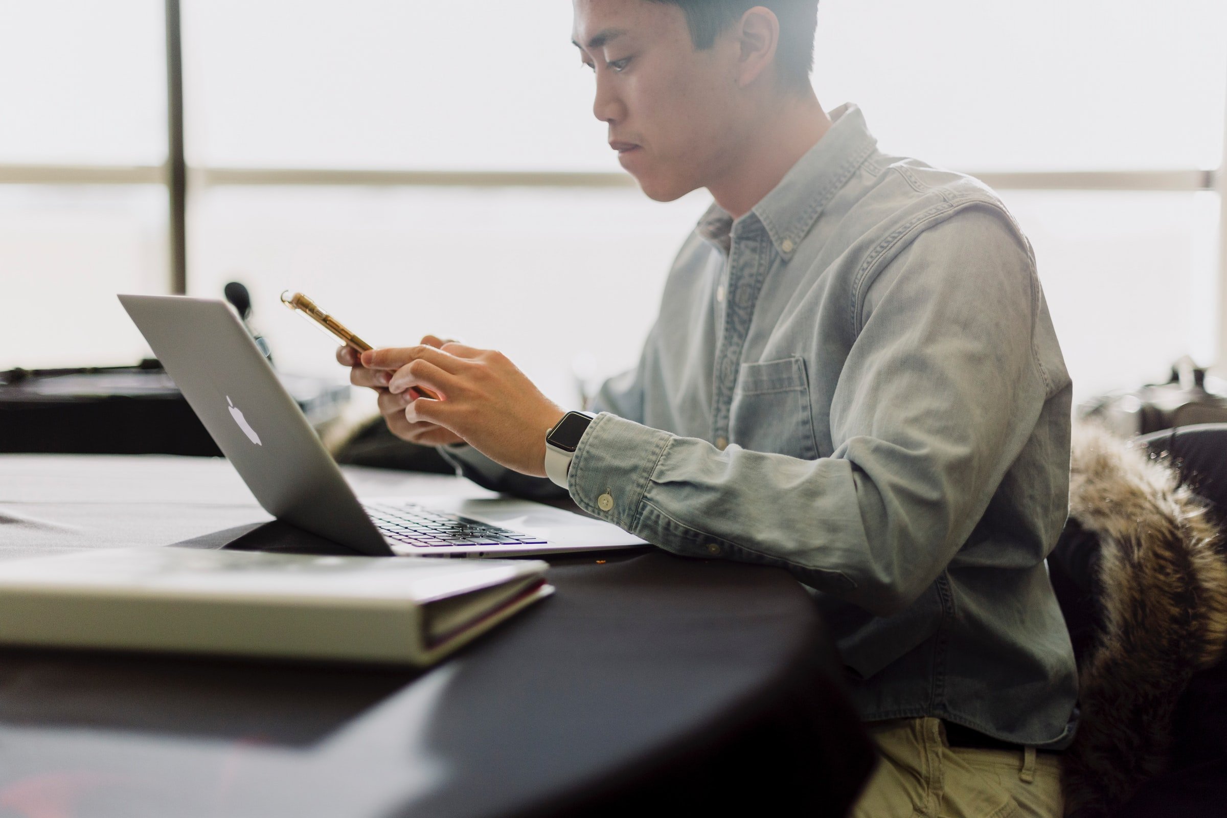 man looking at stocks